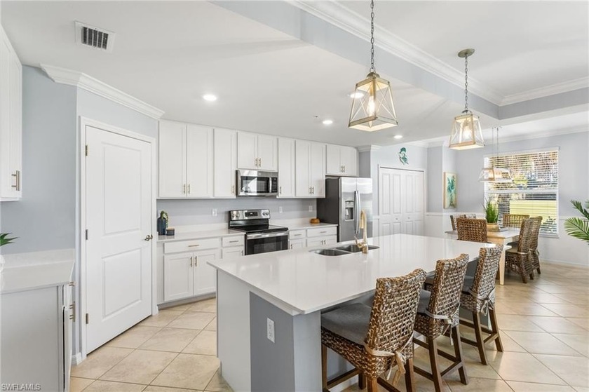 BUNDLED GOLF INCLUDED! Welcome to your sanctuary at The National - Beach Condo for sale in Ave Maria, Florida on Beachhouse.com