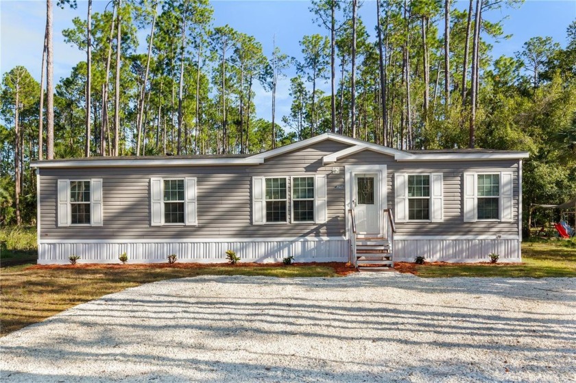 One or more photo(s) has been virtually staged. Step into this - Beach Home for sale in Bunnell, Florida on Beachhouse.com