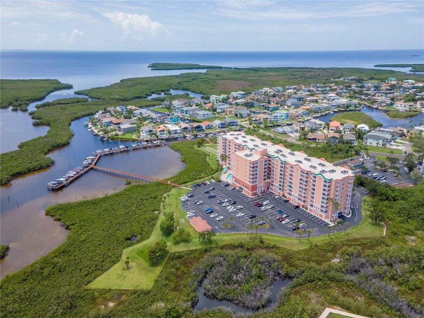 Welcome to 9th-floor coastal living. This 3-bedroom, 2-bath, 1 - Beach Condo for sale in New Port Richey, Florida on Beachhouse.com