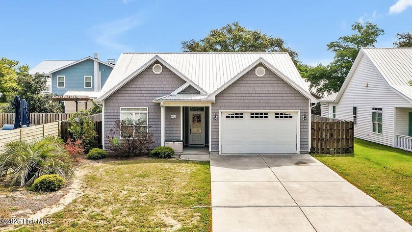 There is a special Relaxed Retreat tucked away on one of the - Beach Home for sale in Oak Island, North Carolina on Beachhouse.com