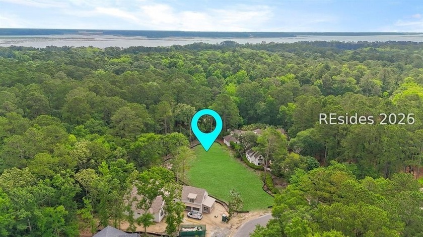 Nestled within the private gates of Berkeley Hall, this - Beach Lot for sale in Okatie, South Carolina on Beachhouse.com