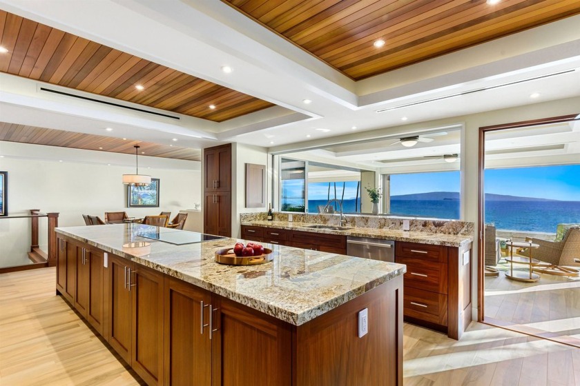 Experience unparalleled luxury and breathtaking ocean views in - Beach Condo for sale in Kihei, Hawaii on Beachhouse.com