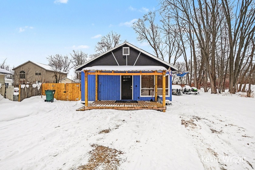 This charming 2-bedroom, 1-bath bungalow is nestled in the - Beach Home for sale in Norton Shores, Michigan on Beachhouse.com
