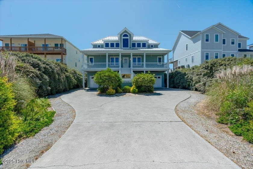 Discover coastal elegance in this exceptional oceanfront - Beach Home for sale in North Topsail Beach, North Carolina on Beachhouse.com