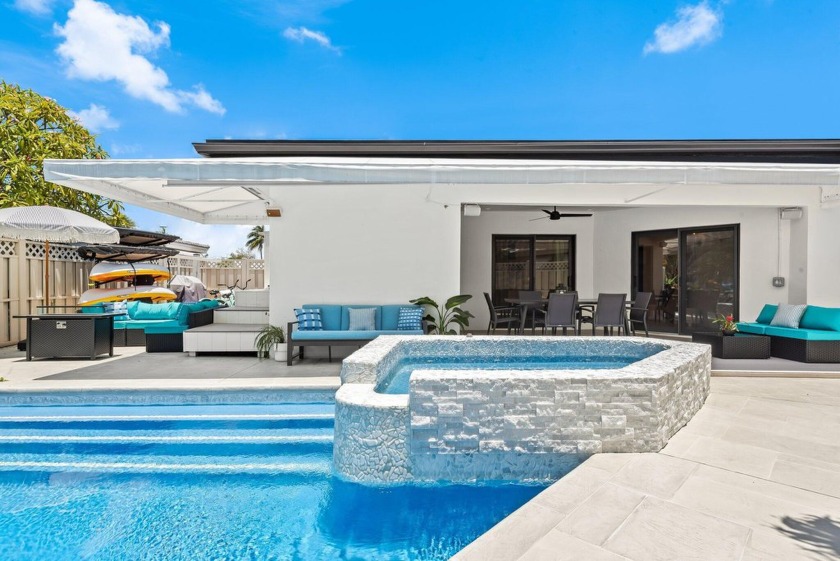 Experience coastal luxury in this fully updated 5-bedroom, 4 - Beach Home for sale in Pompano Beach, Florida on Beachhouse.com