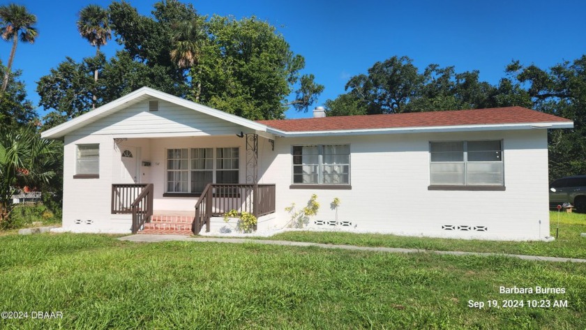 This solid block constructed 4 bedroom 2 bath house is located - Beach Home for sale in Daytona Beach, Florida on Beachhouse.com