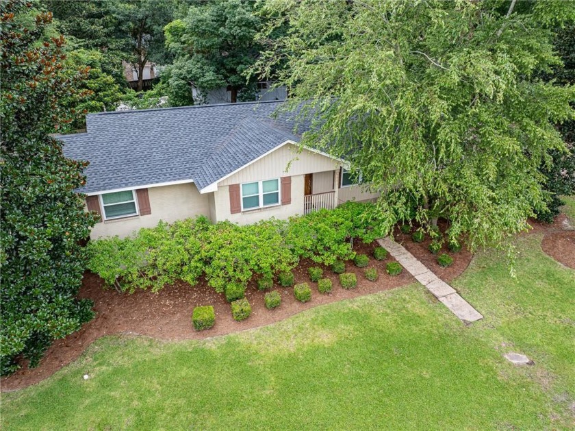 Nestled on the sought-after Stillwood Lane in SpringHill. It's - Beach Home for sale in Mobile, Alabama on Beachhouse.com