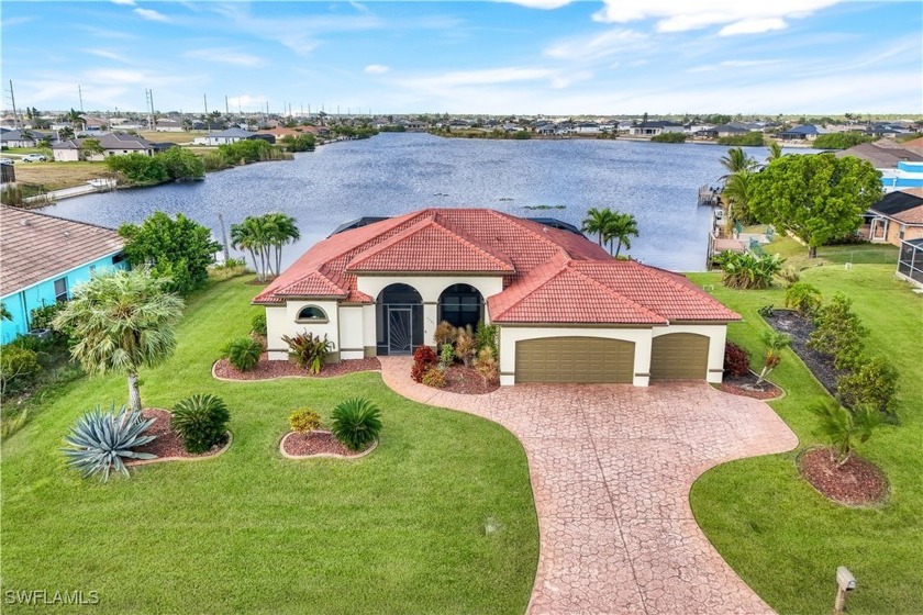 Luxury Waterfront Living On Serene Carousel Lake!  Discover a - Beach Home for sale in Cape Coral, Florida on Beachhouse.com