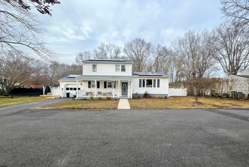 This beautifully maintained split-level home offers the perfect - Beach Home for sale in Egg Harbor Township, New Jersey on Beachhouse.com