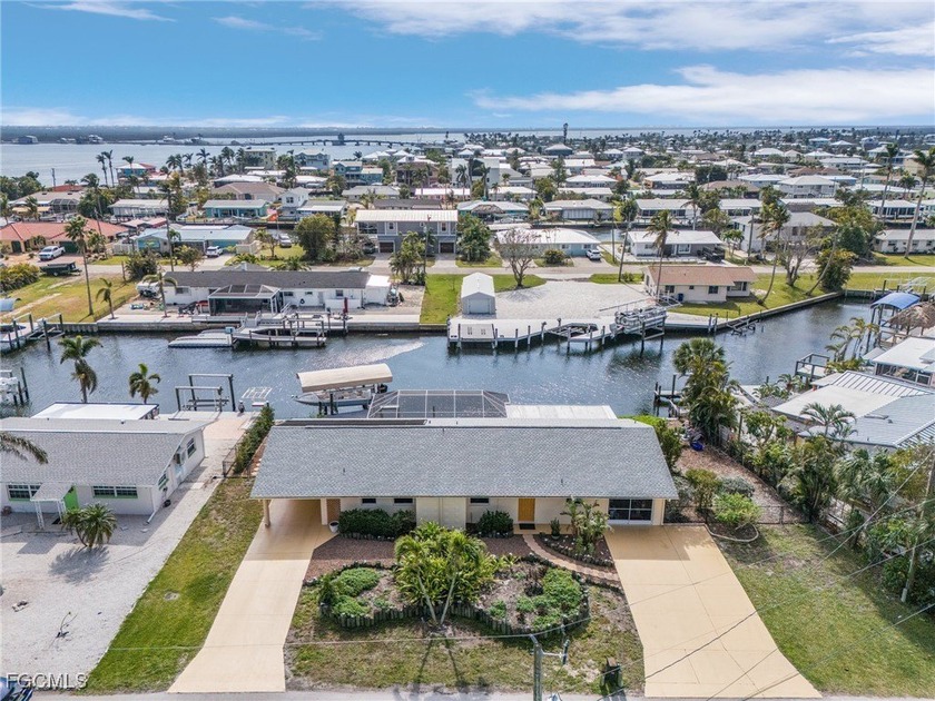 Rare waterfront Duplex on two lots with a pool, boatlift & - Beach Home for sale in Matlacha, Florida on Beachhouse.com
