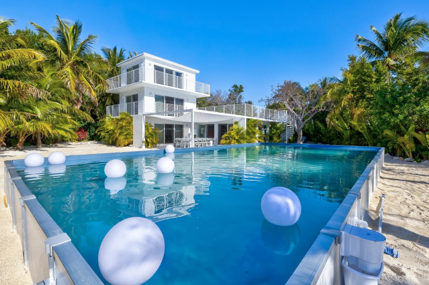 Escape to the Keys in this contemporary and chic seaside Oasis - Beach Home for sale in Key Largo, Florida on Beachhouse.com