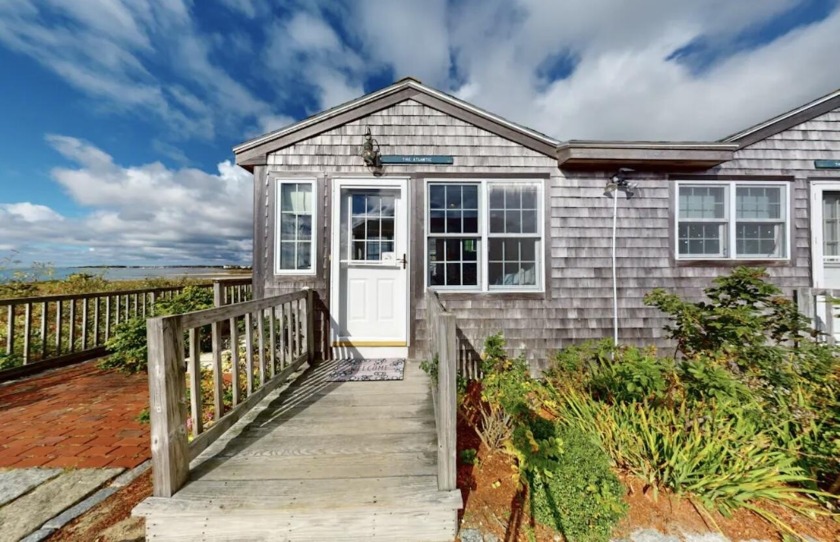 We love the location of this enchanting Nantucket-style seasonal - Beach Condo for sale in West Yarmouth, Massachusetts on Beachhouse.com