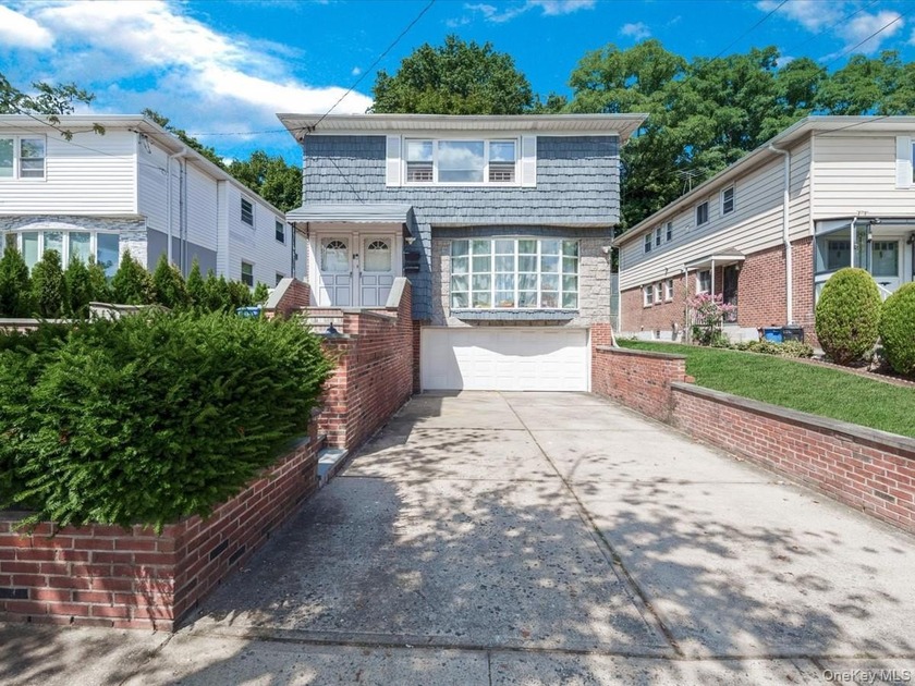 Exceptional opportunity in Douglaston! This spacious two-family - Beach Home for sale in Douglaston, New York on Beachhouse.com