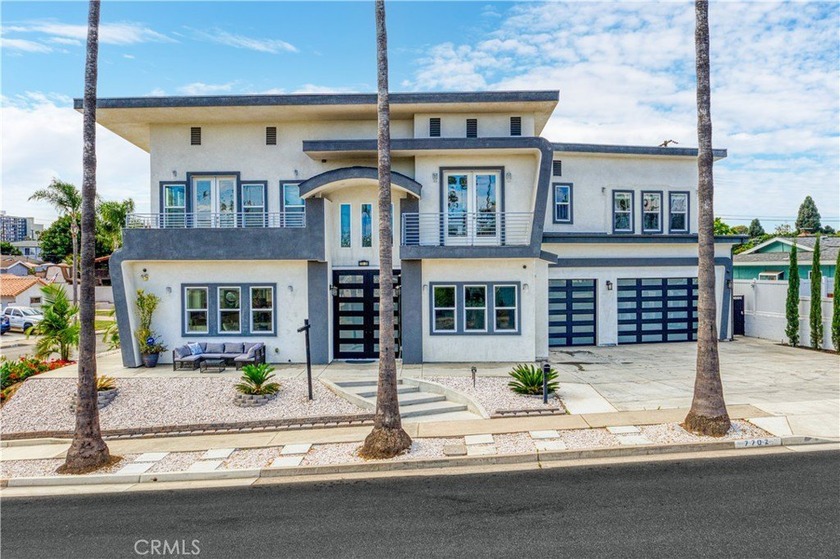Experience the pinnacle of custom luxury at 7702 Alberta Dr., a - Beach Home for sale in Huntington Beach, California on Beachhouse.com