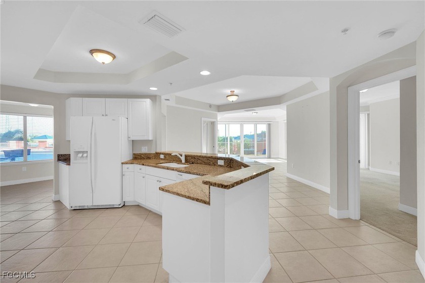 Enjoy a view of the Caloosahatchee River and also a city view of - Beach Condo for sale in Fort Myers, Florida on Beachhouse.com