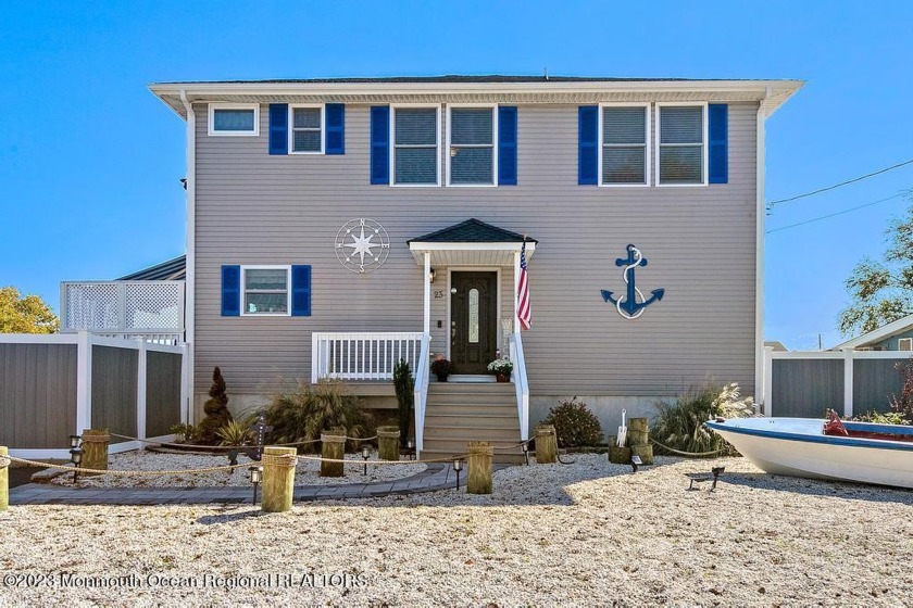 EXCLUSIVE WATERFRONT GEM AWAITS - A DOUBLE LOT PARADISE WITH 100 - Beach Home for sale in Beach Haven West, New Jersey on Beachhouse.com