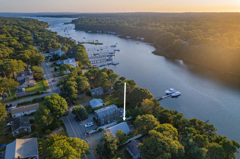 Discover the serenity of waterfront living with this delightful - Beach Home for sale in East Falmouth, Massachusetts on Beachhouse.com