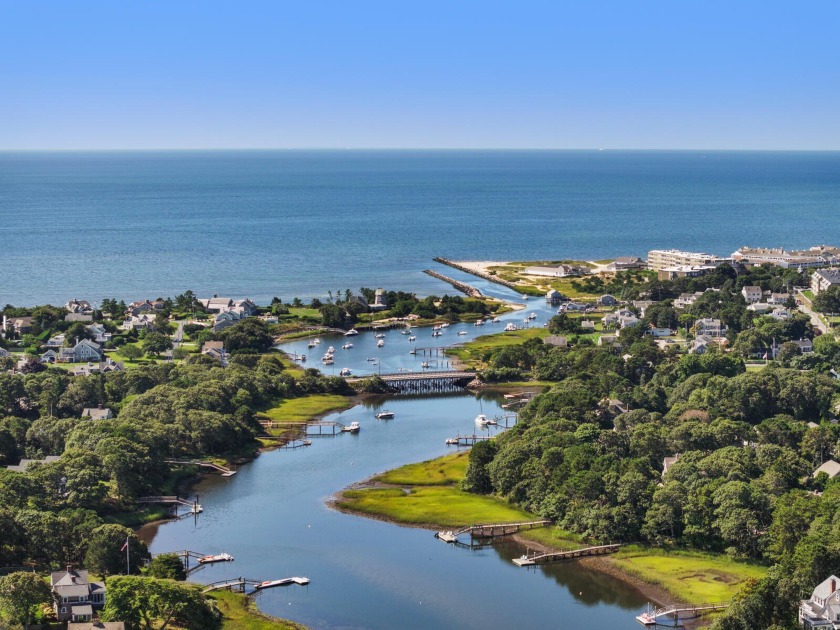 Experience serene waterfront living on the Herring River with - Beach Home for sale in West Harwich, Massachusetts on Beachhouse.com