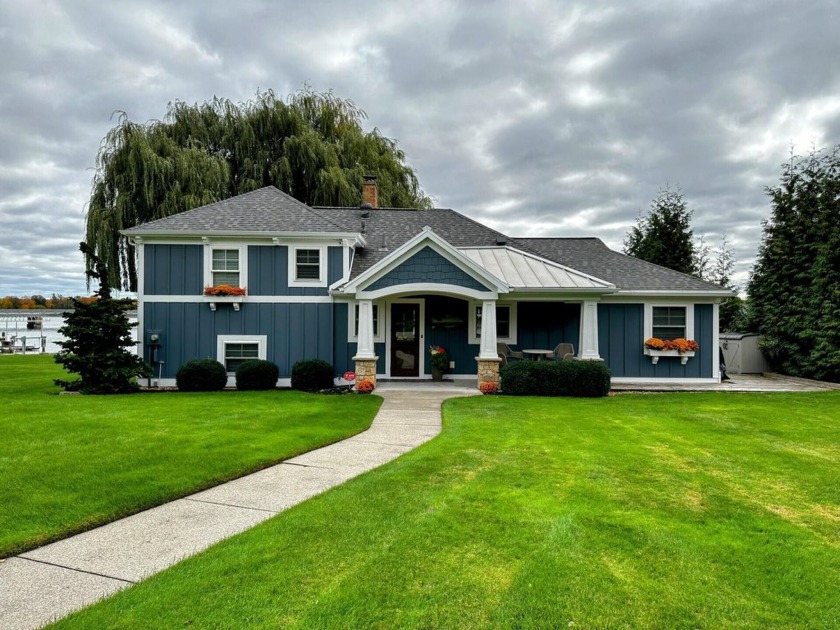 Welcome to your dream waterfront retreat on Spring Lake! This - Beach Home for sale in Spring Lake, Michigan on Beachhouse.com