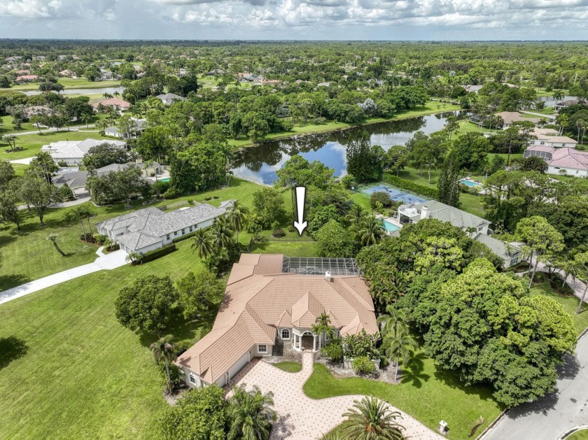 With more than 5,300 square feet under air, this Ecclestone - Beach Home for sale in West Palm Beach, Florida on Beachhouse.com