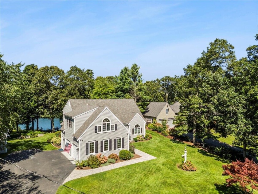 Waterfront on Jenkins Pond. This beautiful home is nestled into - Beach Home for sale in East Falmouth, Massachusetts on Beachhouse.com