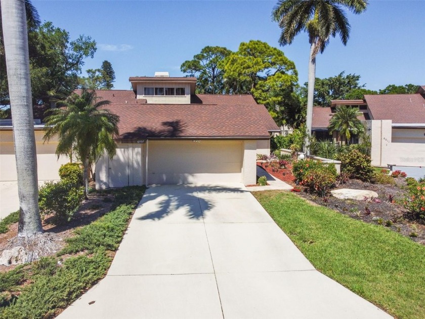 The IMG golf course is just steps away from this large 3-bedroom - Beach Condo for sale in Bradenton, Florida on Beachhouse.com