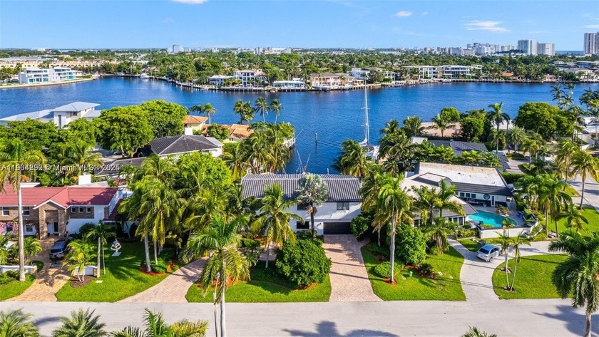This Rare Waterfront Gem includes 6 LARGE BEDROOMS and 4 Full - Beach Home for sale in Pompano Beach, Florida on Beachhouse.com