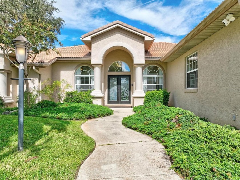 Gorgeous move-in ready 4/3/3 home on a tip lot in *Sailboat - Beach Home for sale in Palm Coast, Florida on Beachhouse.com