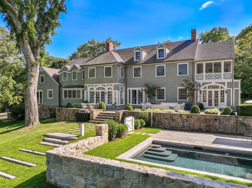 The epitome of coastal elegance on Cape Cod, this Architectural - Beach Home for sale in Falmouth, Massachusetts on Beachhouse.com