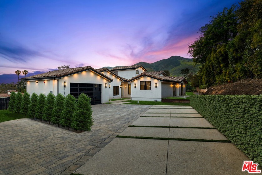 With the blue expanse of the Pacific in one direction and the - Beach Home for sale in Malibu, California on Beachhouse.com