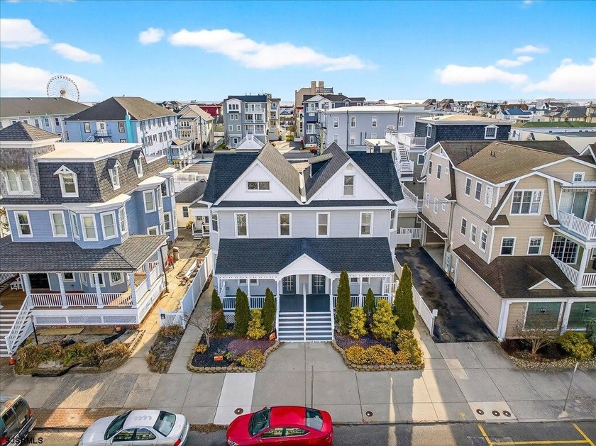 A RARE OPPORTUNITY TO OWN TWO SIDE-BY-SIDE TOWNHOMES! STUNNINGLY - Beach Home for sale in Ocean City, New Jersey on Beachhouse.com