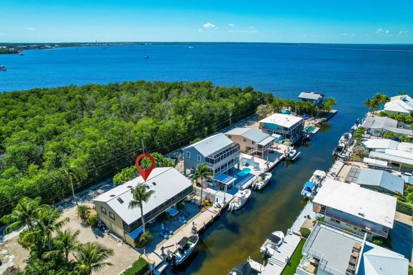 Opportunity to own this 3 bedroom 2 bath concrete waterfront - Beach Home for sale in Key Largo, Florida on Beachhouse.com