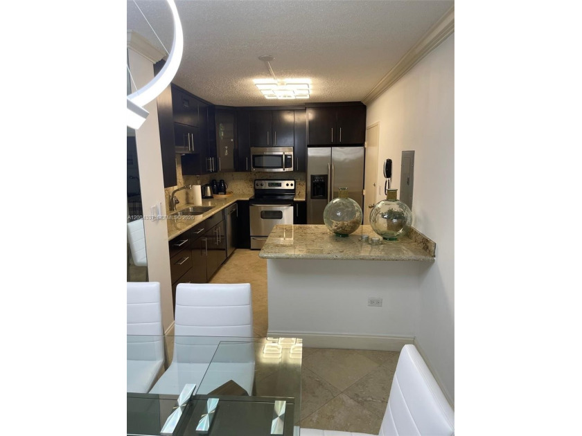 Located on Millionaire's Row in Miami Beach, in an elegant - Beach Condo for sale in Miami Beach, Florida on Beachhouse.com