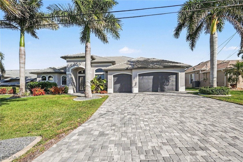 Fantastic 3 bedroom plus den 2 bath 3 car garage gulf access - Beach Home for sale in Cape Coral, Florida on Beachhouse.com