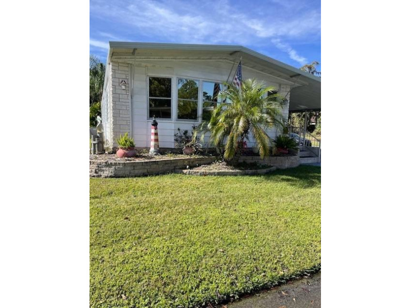 Beautiful 2BR/2BA Home with New Roof, Sunroom & Screened Porch - - Beach Home for sale in Port Orange, Florida on Beachhouse.com