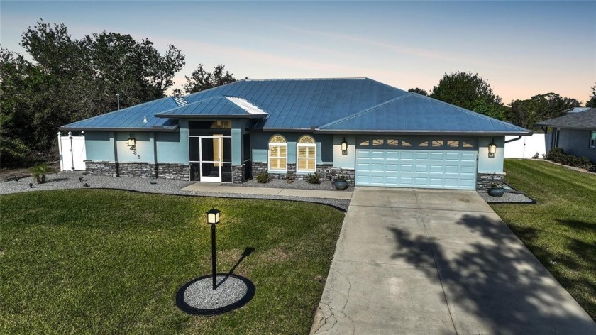 Your dream home awaits you! This LAKE-FRONT pool home comes - Beach Home for sale in Englewood, Florida on Beachhouse.com