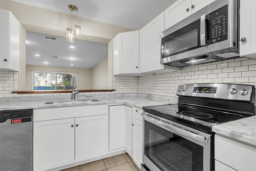 Discover coastal living at its finest in this newly renovated - Beach Condo for sale in Charleston, South Carolina on Beachhouse.com