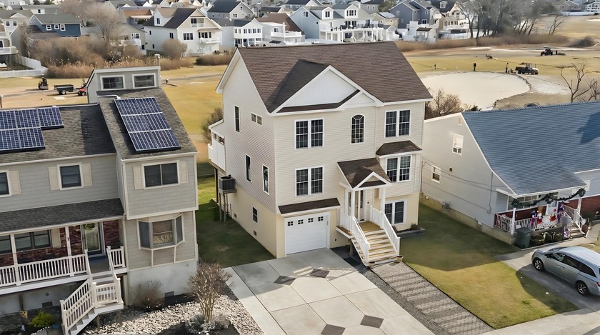 Set along a premier fairway in a coveted beach town, this - Beach Home for sale in Brigantine, New Jersey on Beachhouse.com