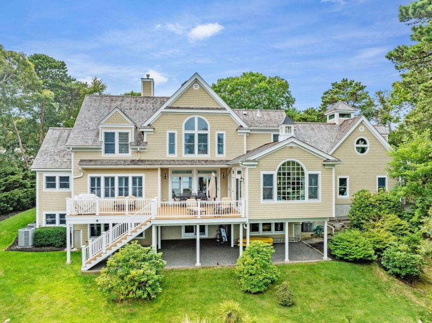 Experience the best of coastal living at this elegant retreat - Beach Home for sale in Mashpee, Massachusetts on Beachhouse.com
