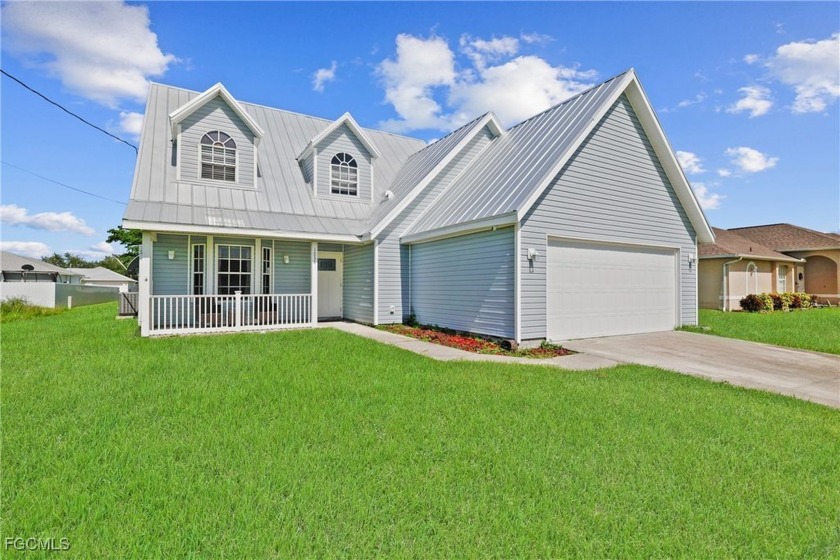 This spacious 4 bedroom, 2.5 bath, 2-story home is waiting for - Beach Home for sale in Cape Coral, Florida on Beachhouse.com