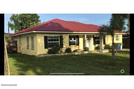 Renovated 4 bedroom, 2 bath lakefront home with large beautiful - Beach Home for sale in Edgewater, Florida on Beachhouse.com