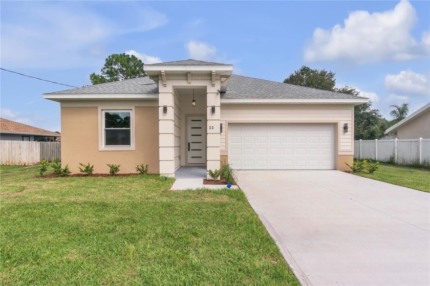 Beautiful New Construction Home in Desirable Palm Harbor - Beach Home for sale in Palm Coast, Florida on Beachhouse.com