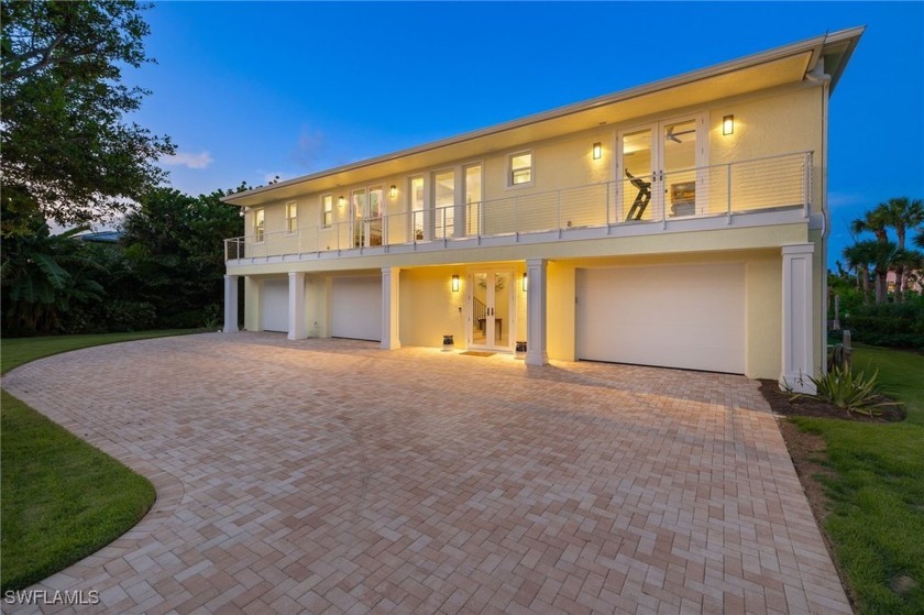 Built in 2017 with resiliency in mind, this elevated concrete - Beach Home for sale in Sanibel, Florida on Beachhouse.com