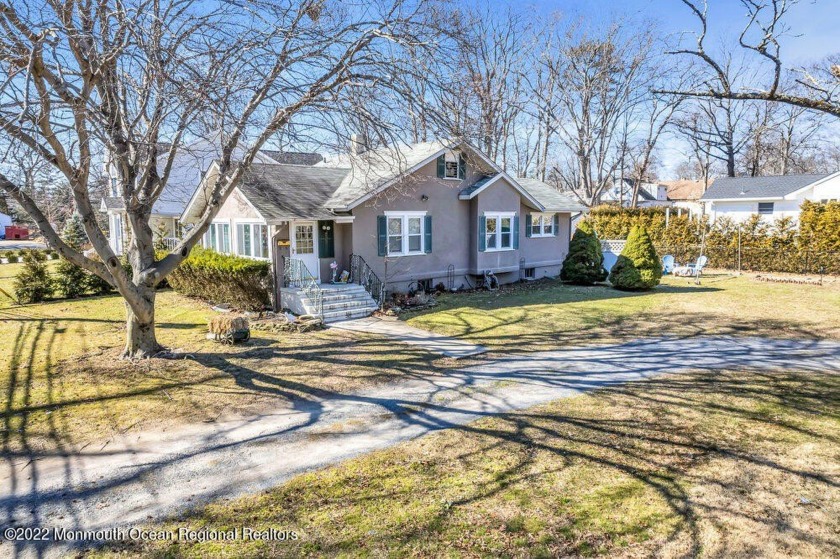 Charming ranch home situated on a lovely corner lot in the - Beach Home for sale in Oakhurst, New Jersey on Beachhouse.com