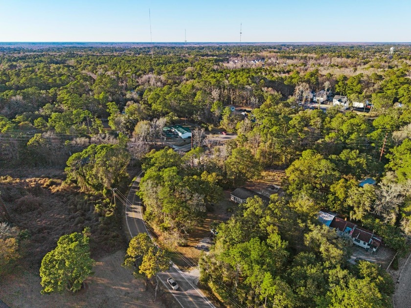 Discover a rare 1.16-acre residential lot on Petigru Drive in - Beach Lot for sale in Pawleys Island, South Carolina on Beachhouse.com