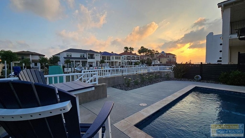 Step into turnkey coastal luxury with a dedicated BOAT SLIP & - Beach Townhome/Townhouse for sale in South Padre Island, Texas on Beachhouse.com