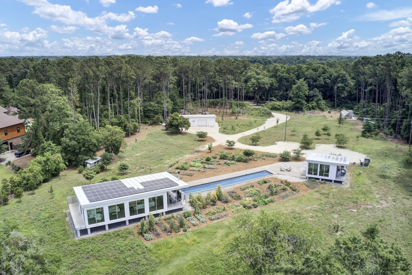 Welcome home to this iconic custom house. This steel, concrete - Beach Home for sale in Johns Island, South Carolina on Beachhouse.com