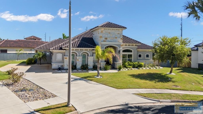 Custom Coastal Retreat in Exclusive Paradise Cove Welcome to - Beach Home for sale in Laguna Vista, Texas on Beachhouse.com