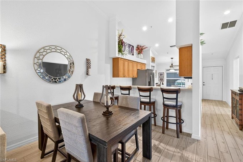 Discover a sun-drenched sanctuary in this stunning second-floor - Beach Condo for sale in Estero, Florida on Beachhouse.com