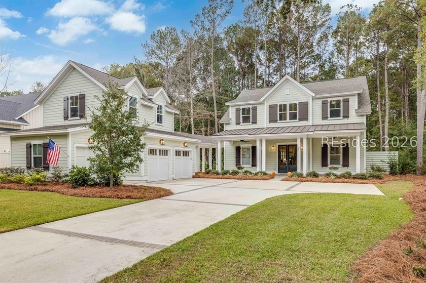 Completed in 2022, this attractive 5-bedroom plus office, 4.5 - Beach Home for sale in Okatie, South Carolina on Beachhouse.com